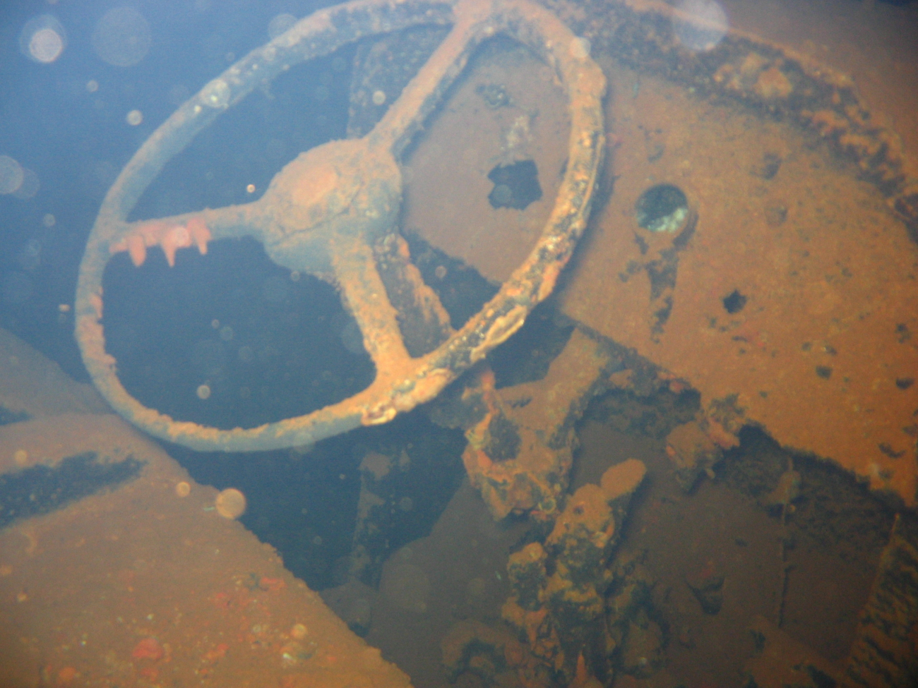 Cab and steering wheel of a truck on the Hoku Maru