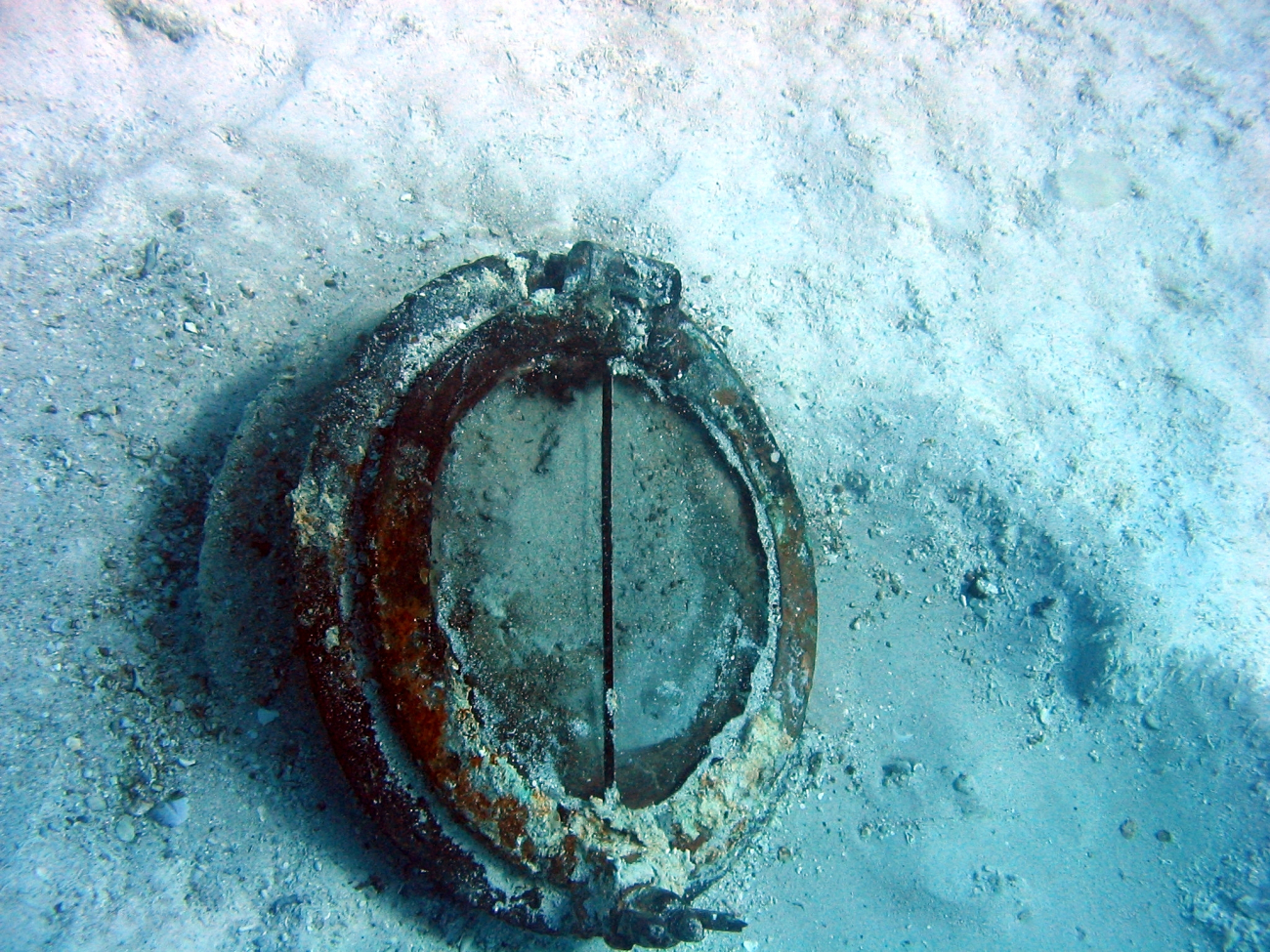 Port hole window from early Twentieth Century wreck on Pearl and Hermes Reef