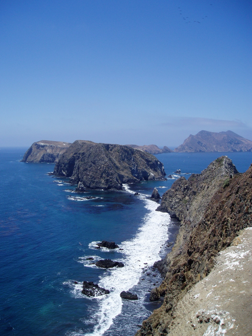 Looking west from East Anacapa Island along the sheer cliffs of the south sideof the island