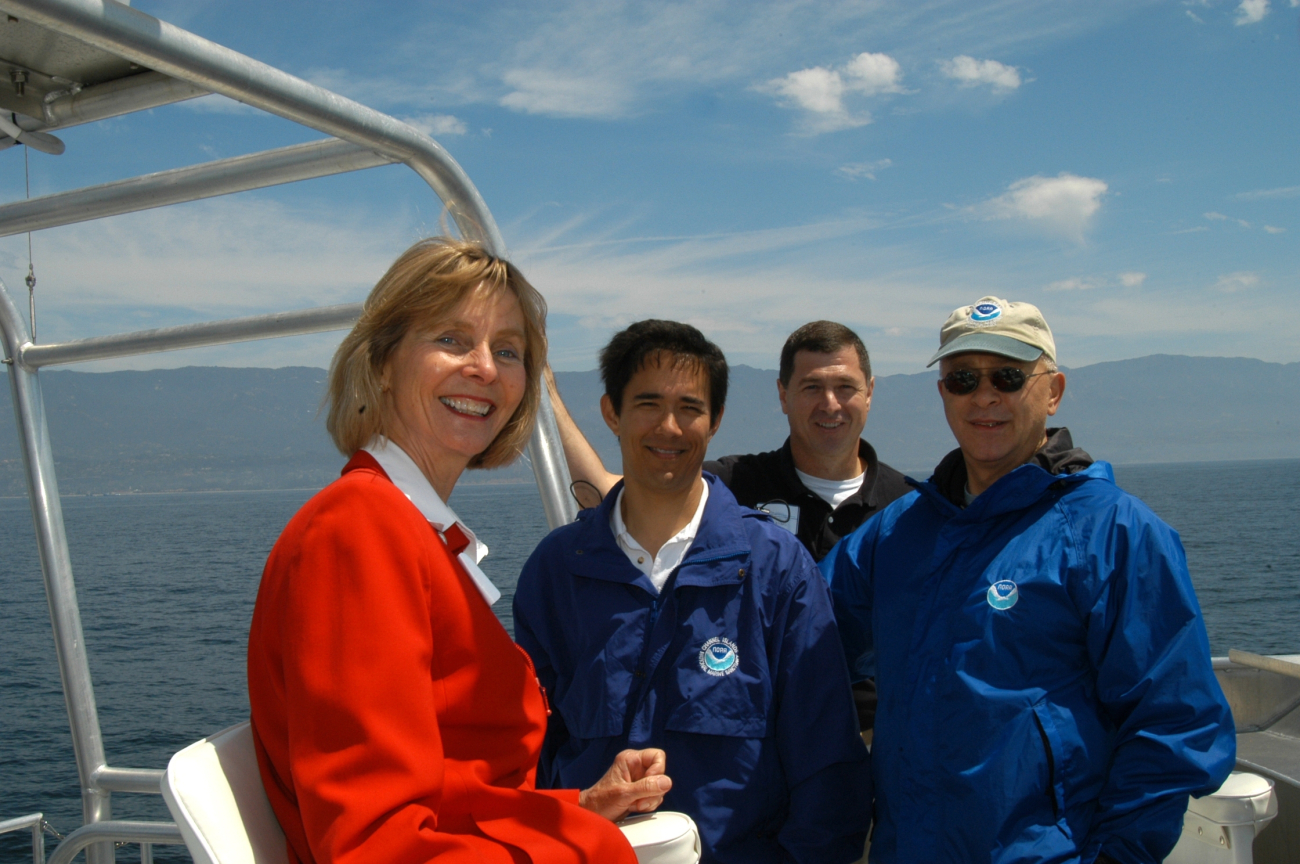 Congresswoman Lois Capps with sanctuary employees Chris Mobley, DanaWilkes, and National Marine Sanctuary Director Dan Basta
