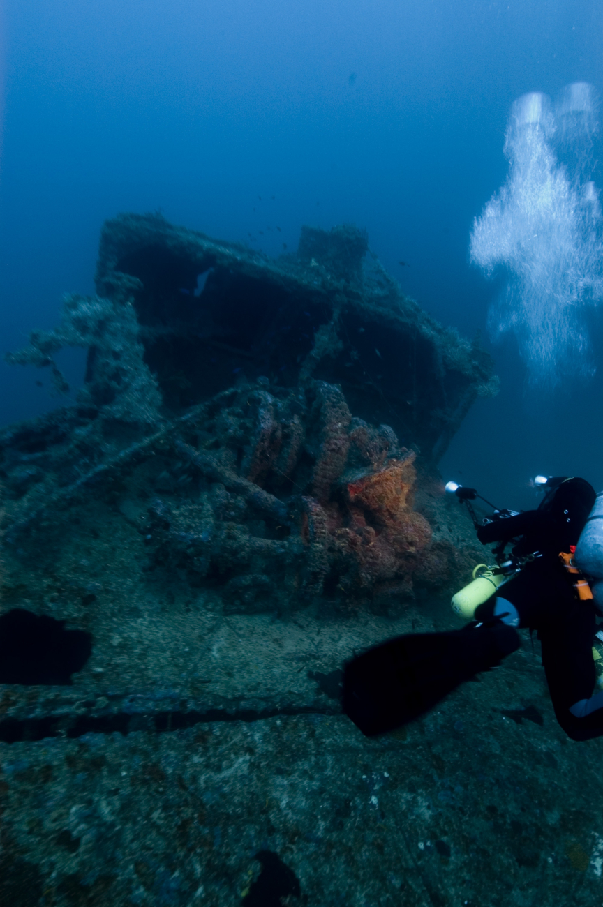 A diver on the bow of the NORTHERN LIGHT, a shipwreck in 190 feet waterdepth