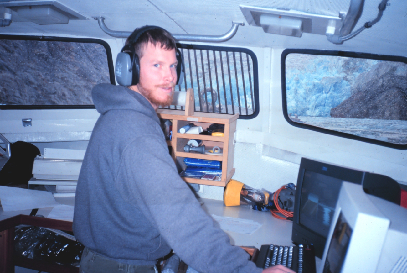 Assistant Survey Tech Scot Warrender operating the computers aboard RA-1