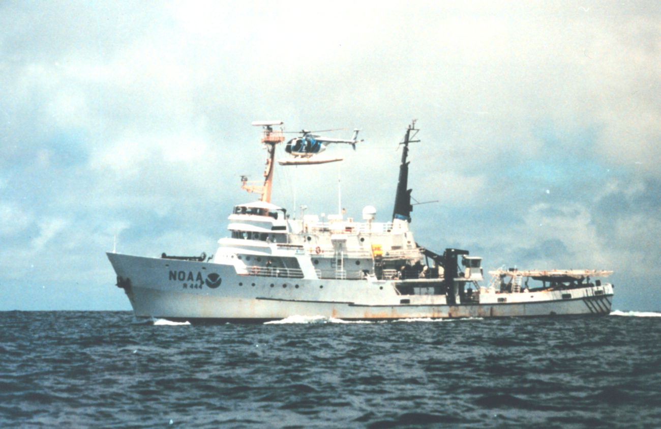 NOAA Ship DAVID STARR JORDAN and MD500 helicopter duringmarine mammal studies in the tropical east Pacific Ocean