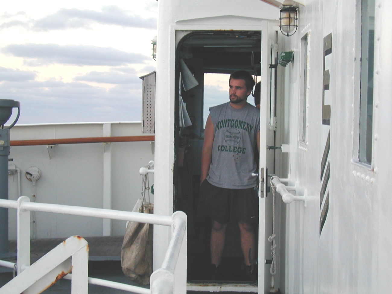 NOAA Ship McARTHUR deck hand Mike Theberge on the bridgewing