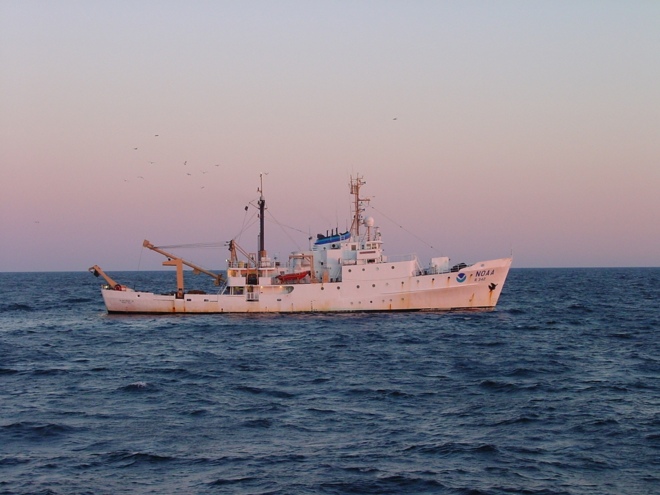 NOAA Ship ALBATROSS IV with trawling into the sunset