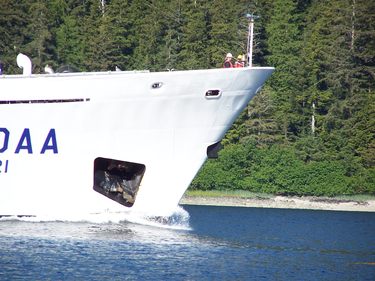 Bow of the NOAA Ship RAINIER cruising in Alaskan waters