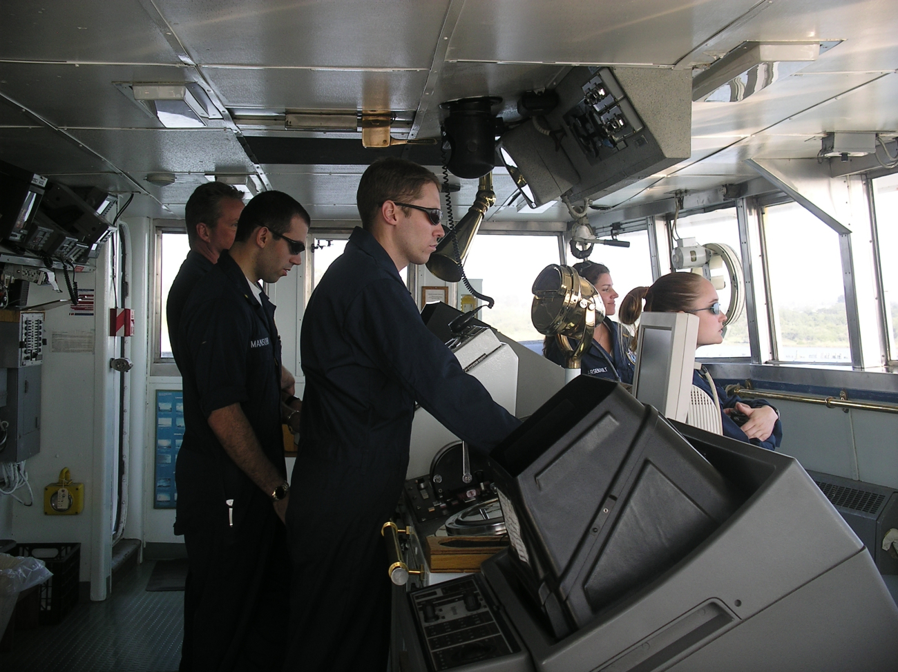 Officers on the Miller Freeman piloting the ship leaving portduring the 2005 NWFSC Acoustic Hake Survey