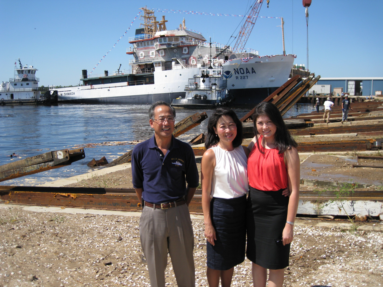 Allen Shimada, Mimi Shimada, and Allen's niece with the NOAA ShipBELL SHIMADA in the background