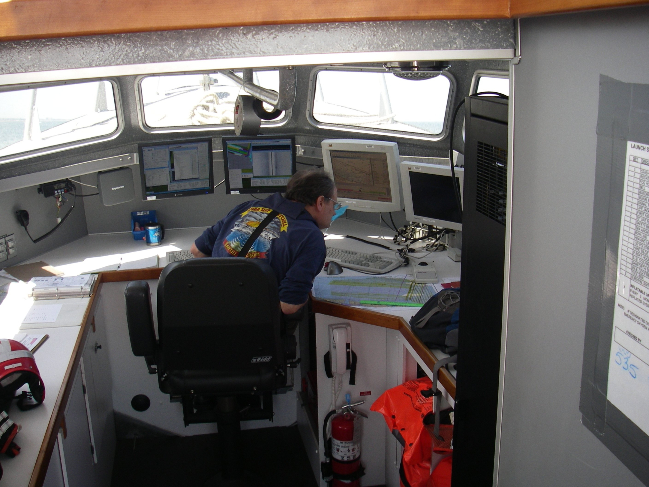 Peter Liewit, Senior Survey Tech, on NOAA Ship THOMAS JEFFERSON,conducting survey operations during launch hydro