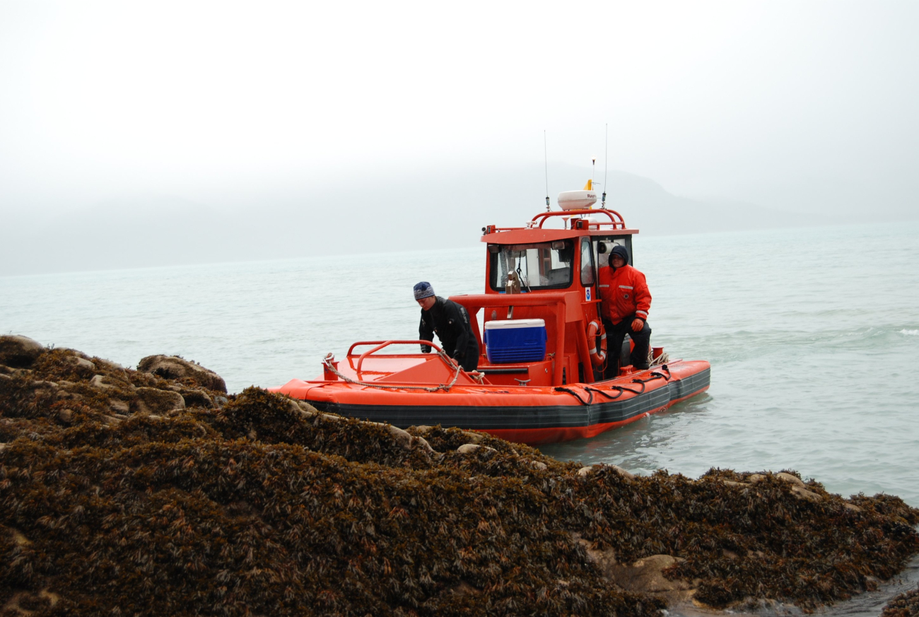 Rigid hull inflatable boat (RHIB) supporting tide gage operations
