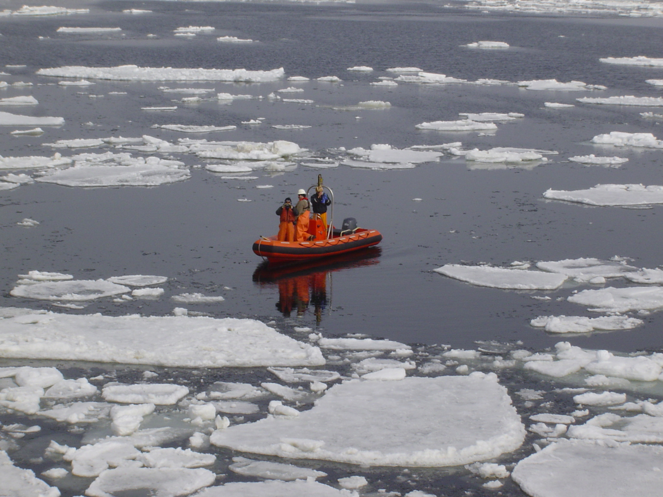NOAA Ship MILLER FREEMAN rigid hull inflatable boat in the ice of theBering Sea