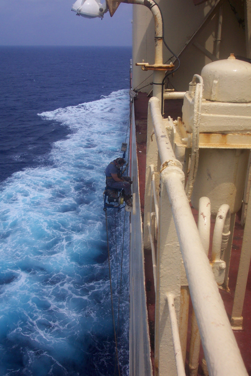 Working over the side on a bosun's chair on the SEALAND COMMITMENT somewhere inthe Mediterranean