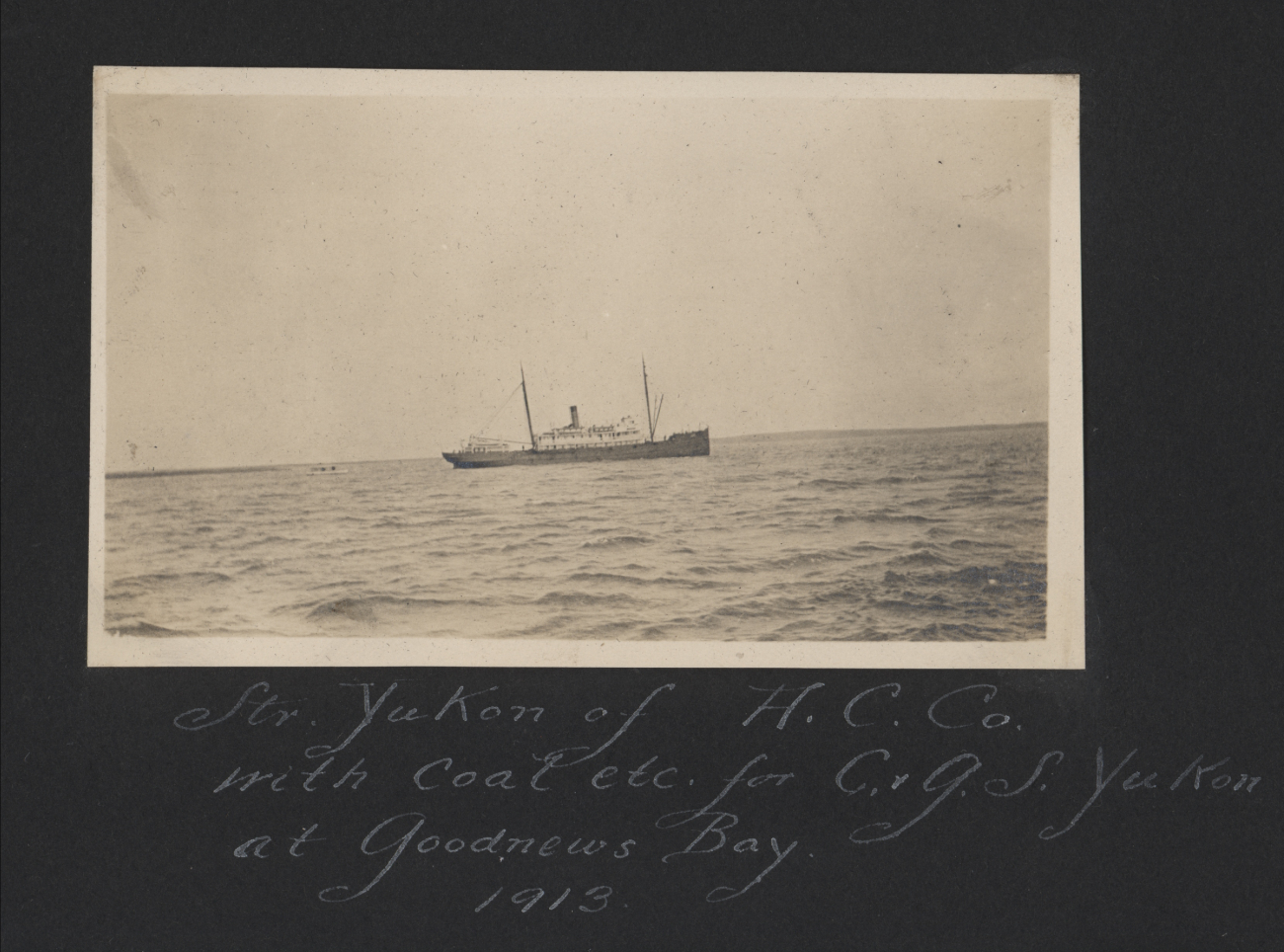 Steamer YUKON of the Alaska Commercial Company with coal for the C&GS; shipYUKON at Goodnews Bay