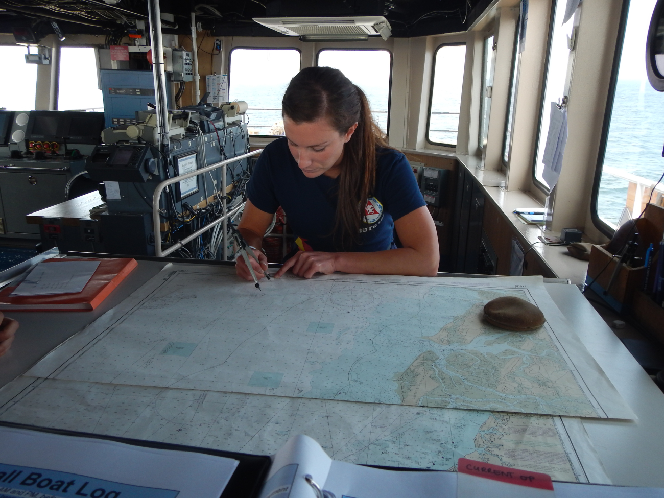Ensign Felicia Drummond plotting position of NOAA Ship NANCY FOSTERin vicinity of Gray's Reef National Marine Sanctuary off the Georgia coast