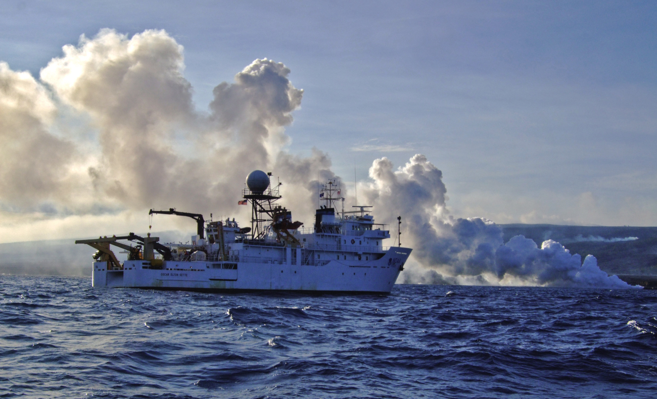 NOAA Ship OSCAR ELTON SETTE standing offshore from Kilauea lavaflow