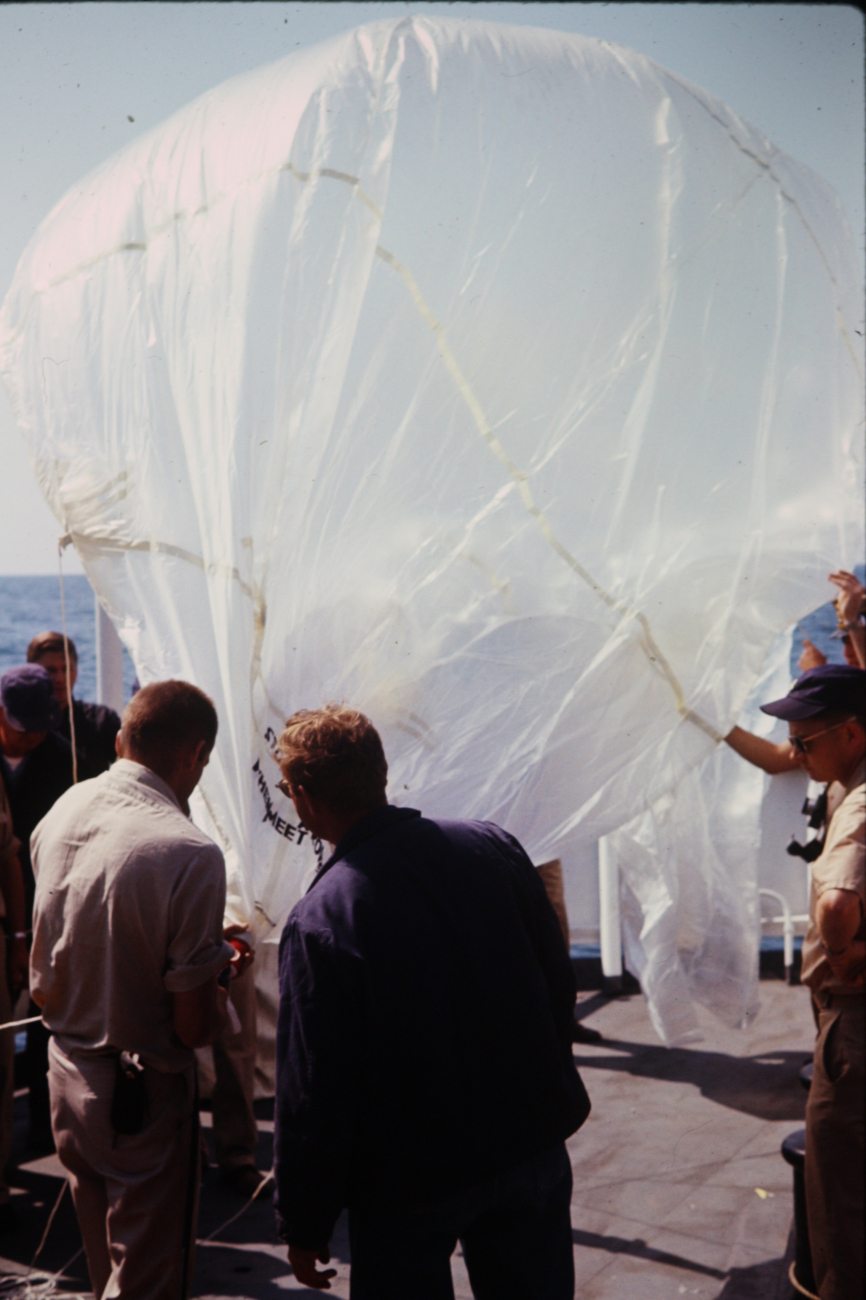 Inflating balloon for data pickup by C-130 aircraft