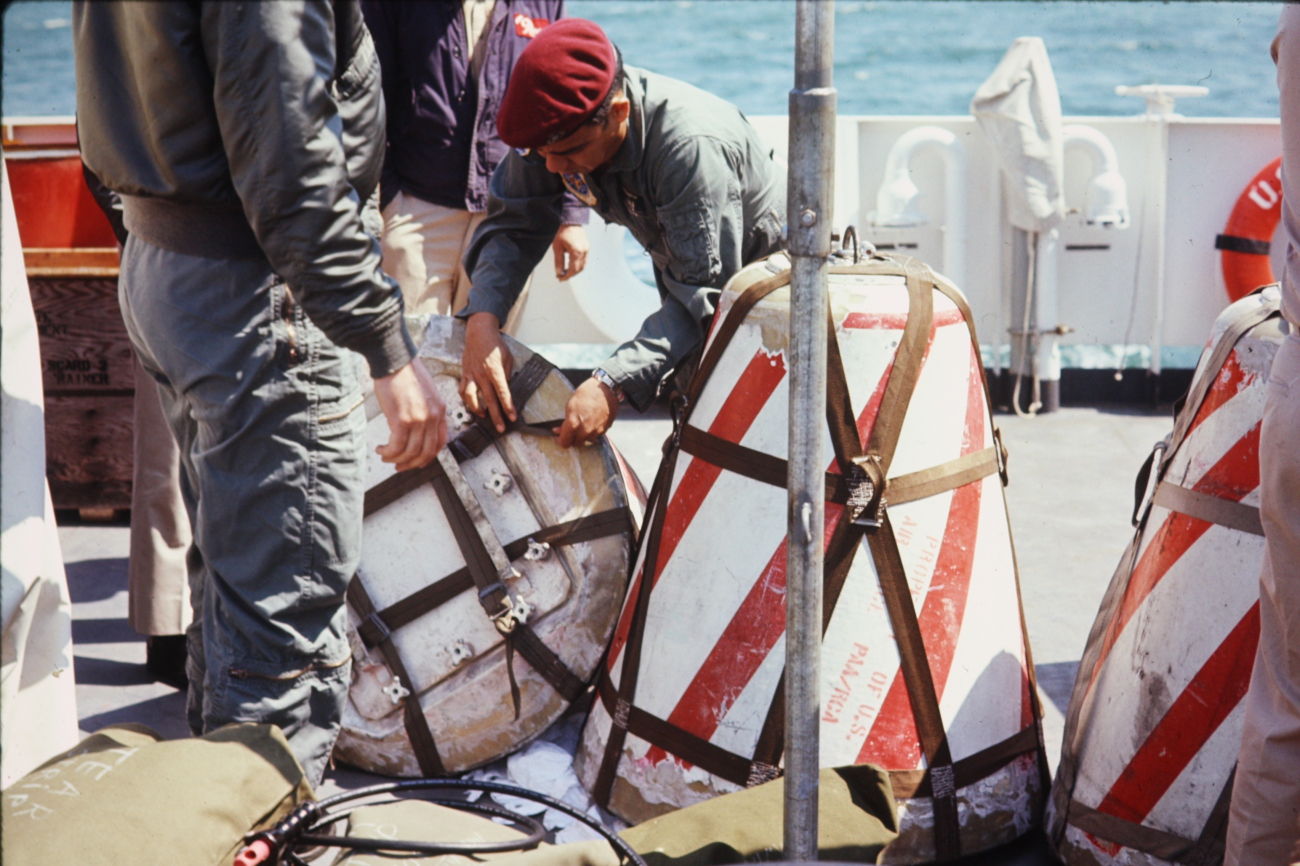 Data canister being prepared for streaming below balloon for pickup by C-130aircraft