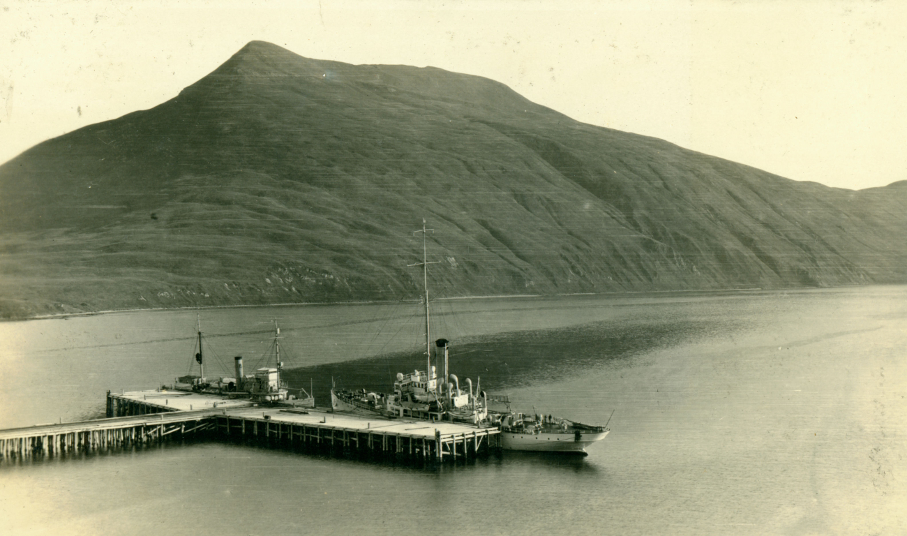 Coast and Geodetic Survey Ship DISCOVERER (L) tied up bow to bow withCoast Guard cutter at Dutch Harbor