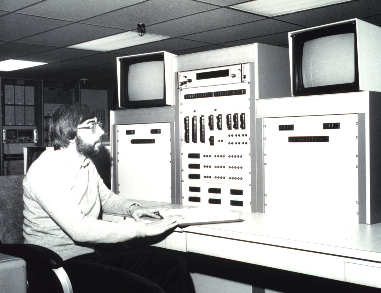 Satellite Operations Control Center (SOCC) Controller James Budd at TIROS-NController's console, from which two operational TIROS-N type spacecraft arecontrolled