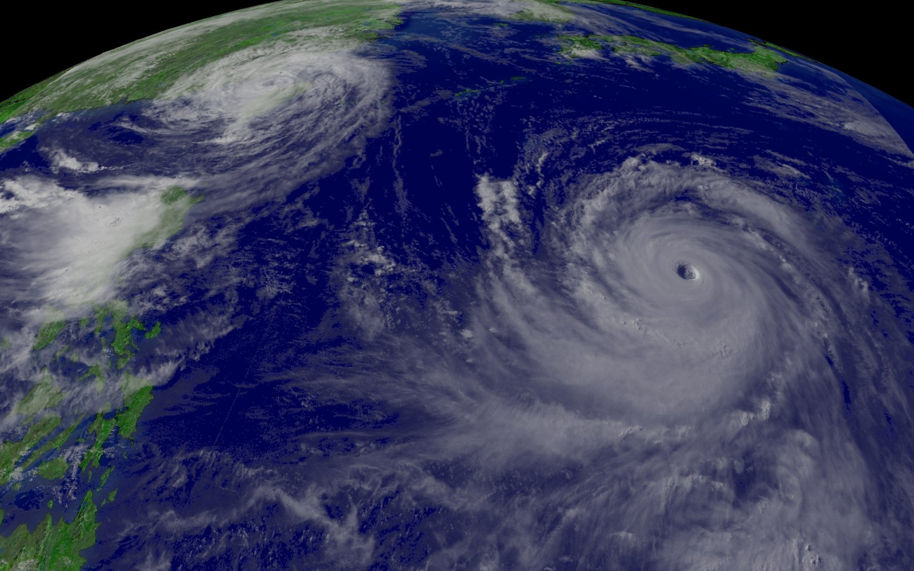 Super Typhoon Chaba churns away in the western Pacific Ocean while Typhoon Aerepasses over Taiwan