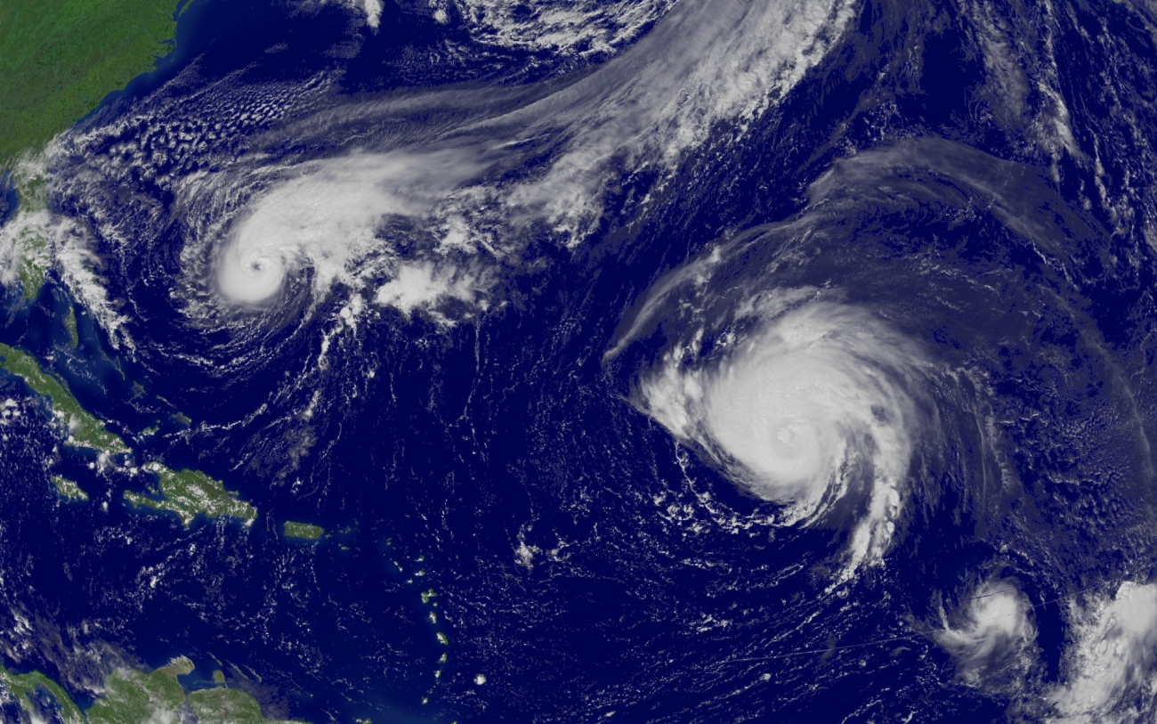Hurricane Jeanne, Hurricane Karl, and Tropical Storm Lisa are all in view fromwest to east