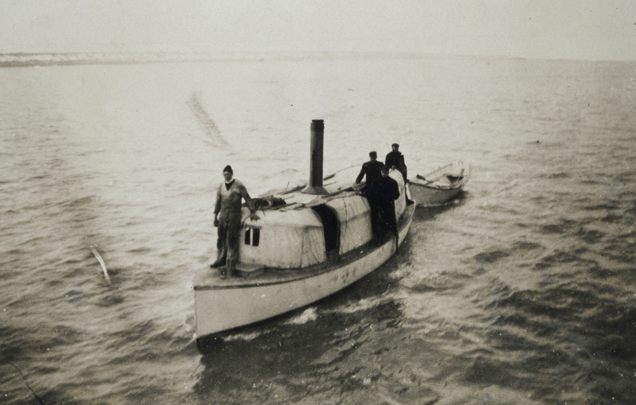 Steam launch towing skiff