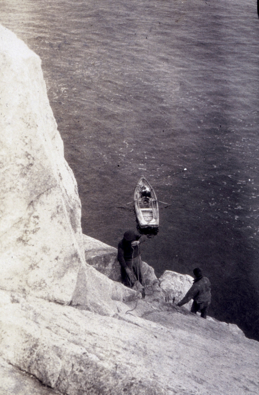 Landing at base of cliff