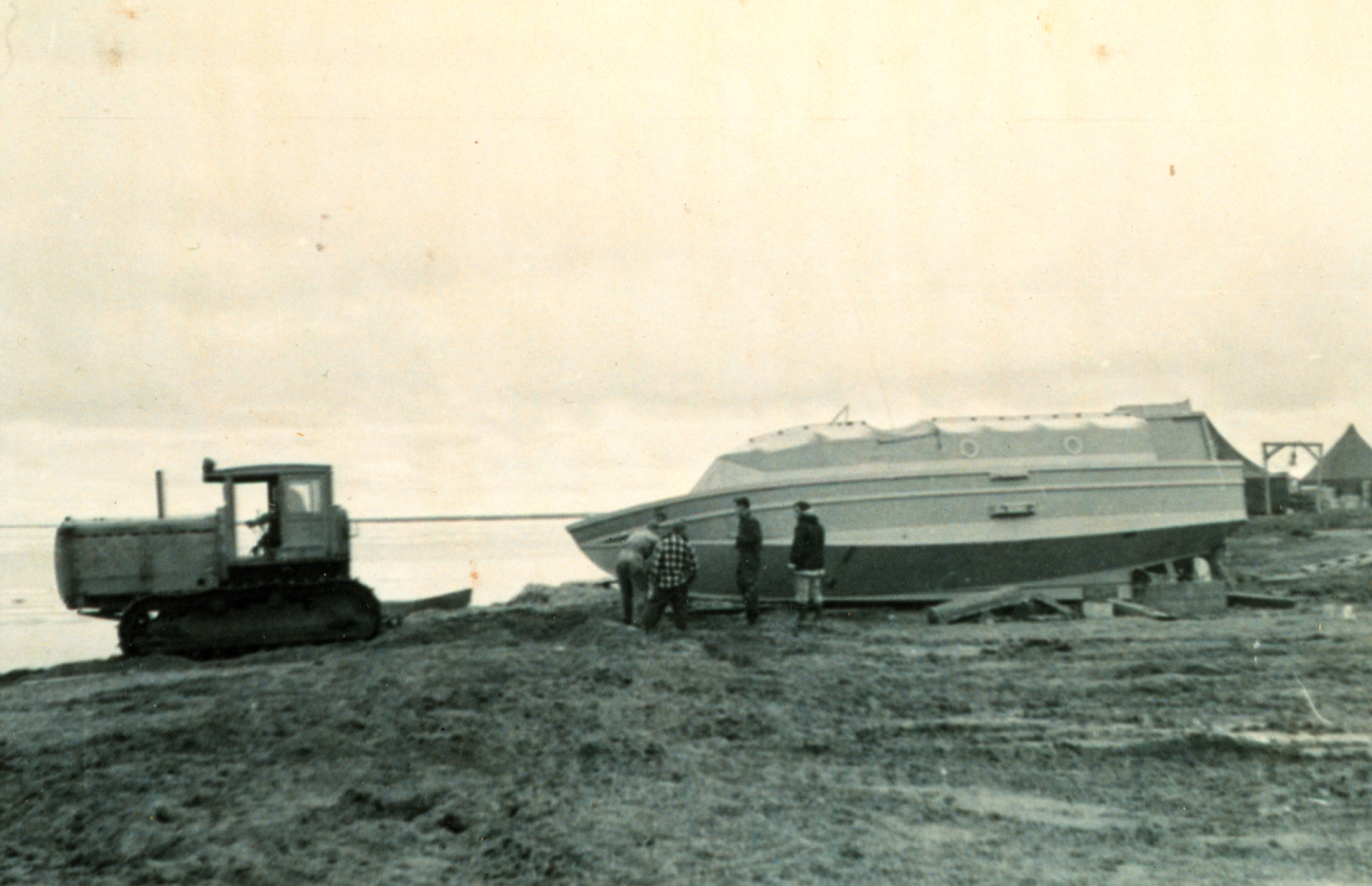 Launching survey boat with D-8 caterpillar at Nevat Camp