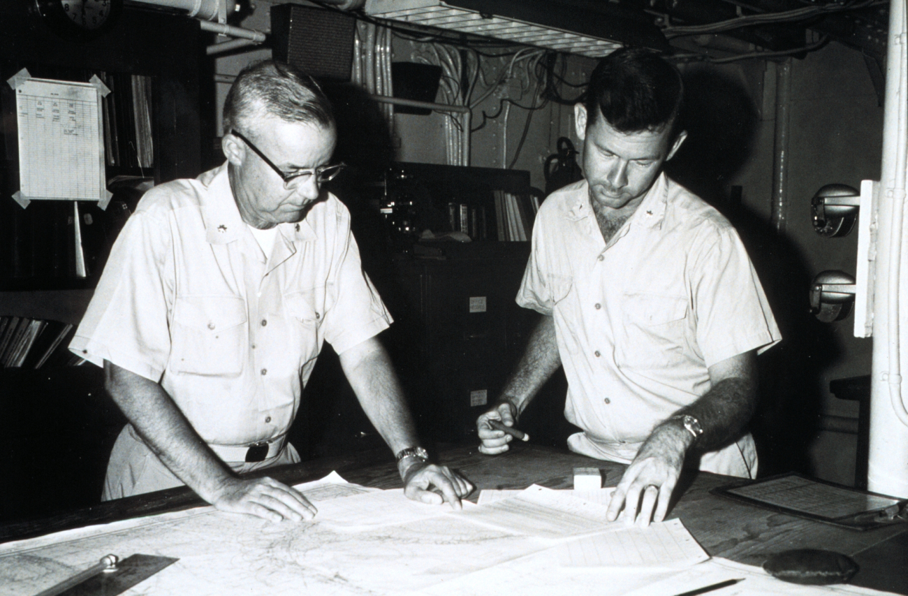 Commander Harry Reed on left, commanding officer of HYDROGRAPHER;Lieutenant Commander Kelly Taggart on right, field operations officer