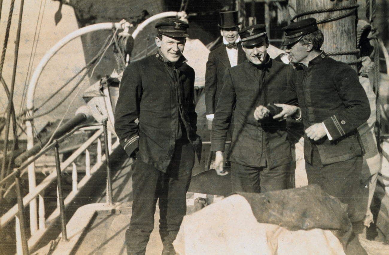 Unidentified officers on C&GS; ship before the ironing board was invented