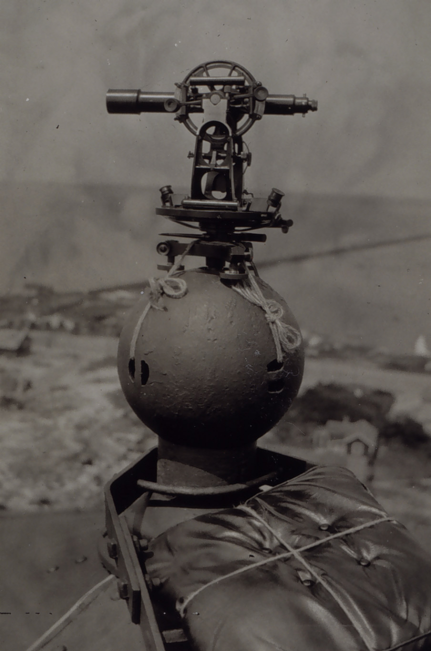 Theodolite tied on top of water tank