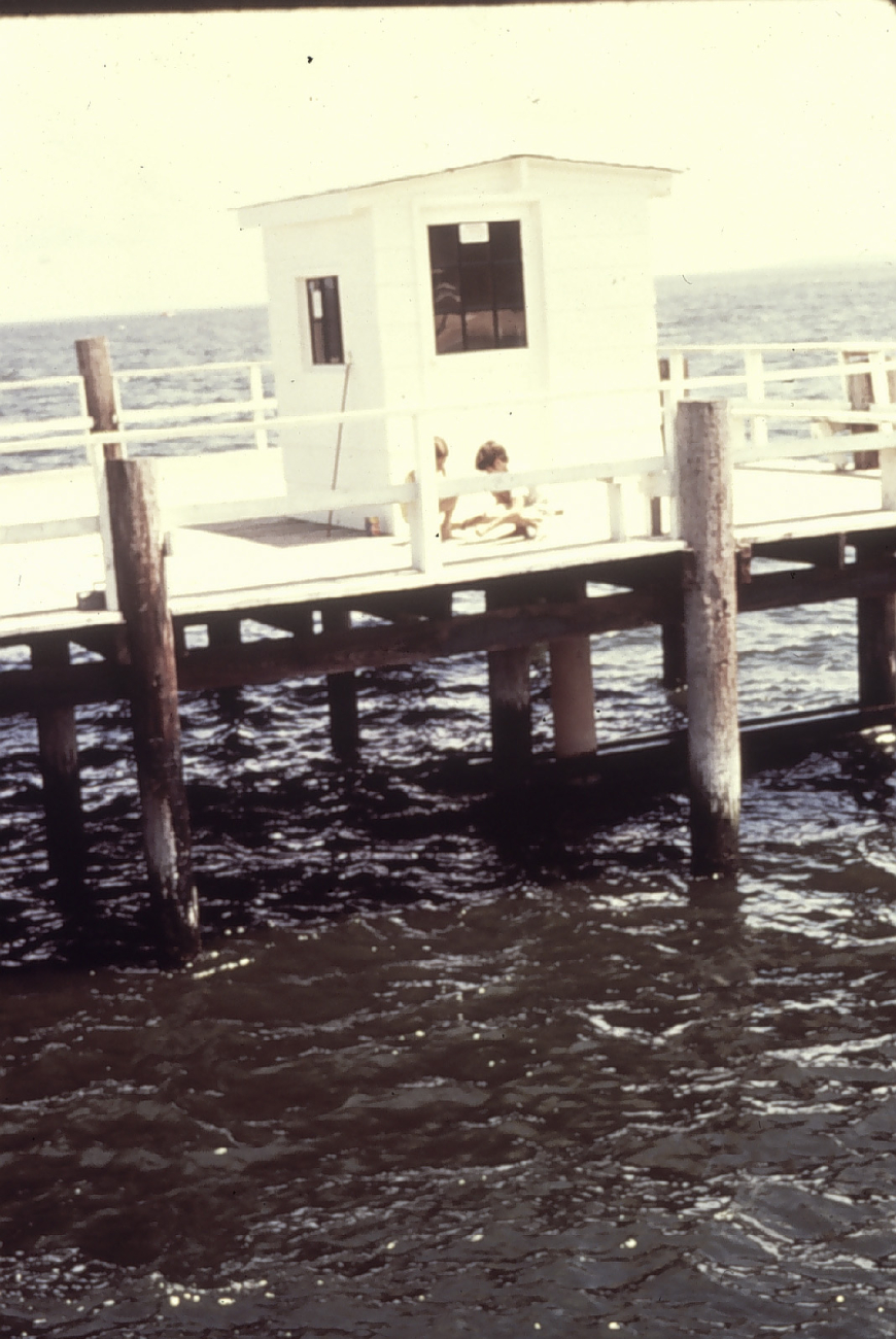 Tide gauge house on pier along southeast Atlantic coast