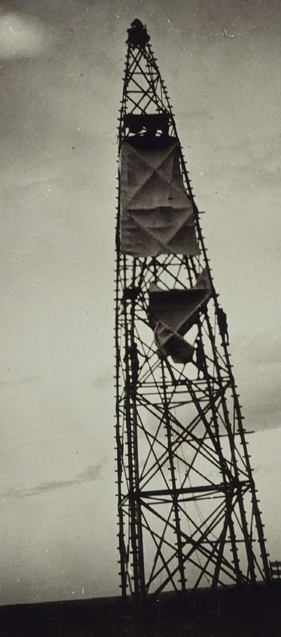 Wind tarps draping tower at Station Bippus