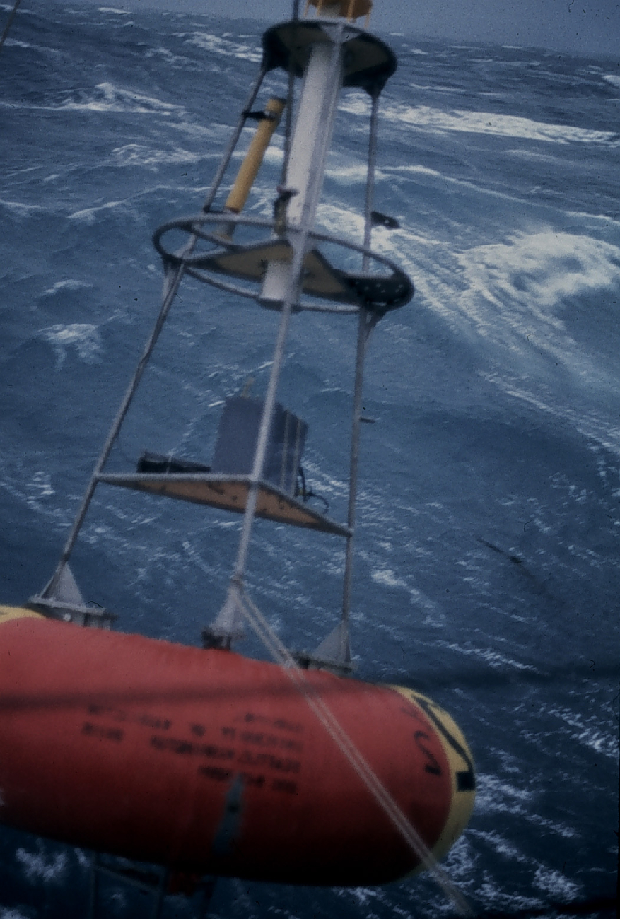 Deploying deep-sea oceanographic buoy in rough seas