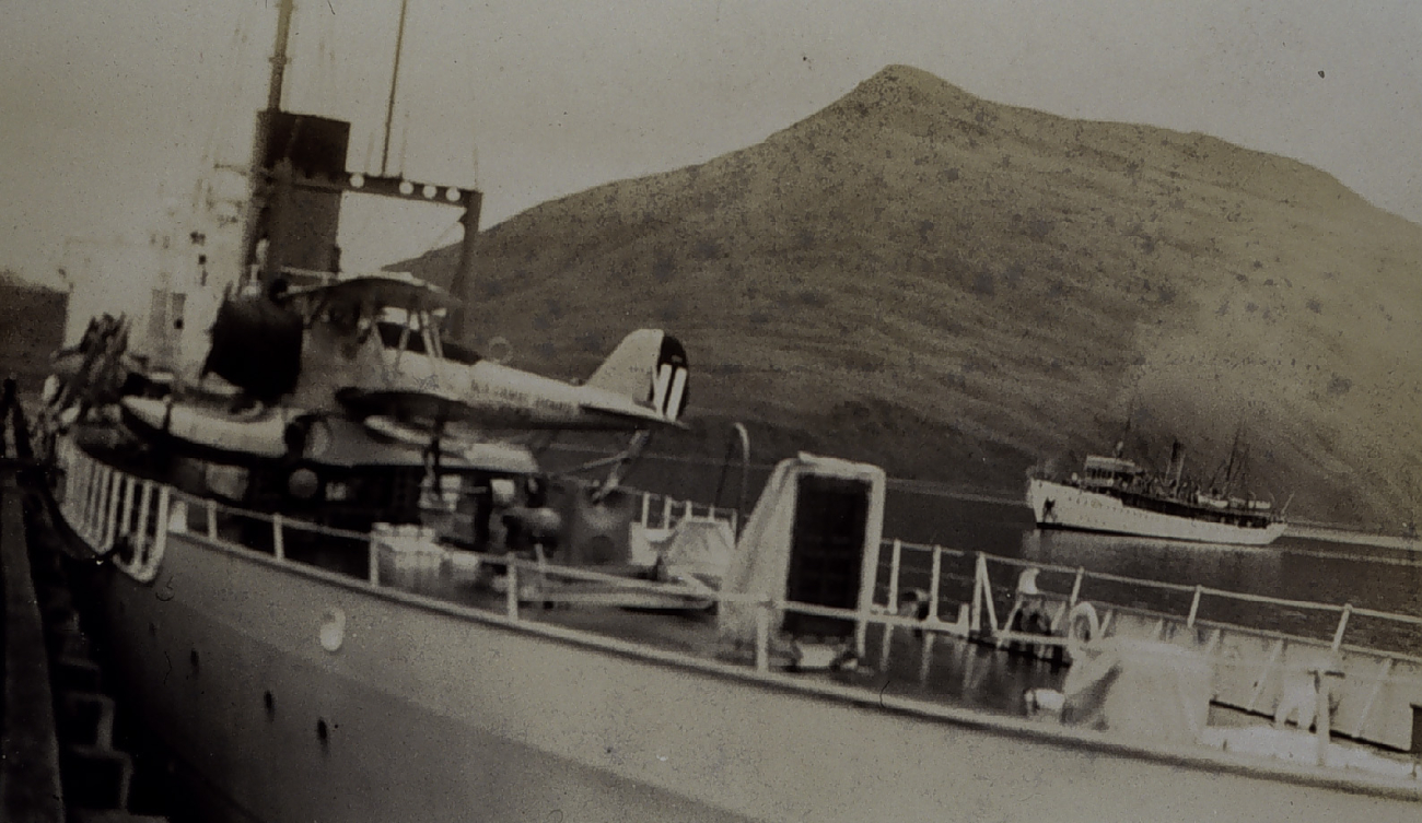 Coast and Geodetic Survey Ship SURVEYOR as seen over the stern of a Navy cruiser