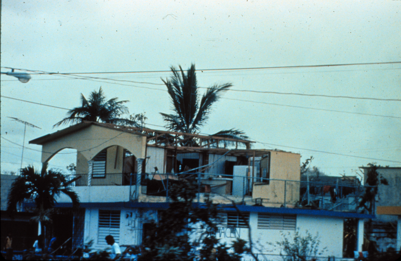 Damage to conventional housing at LuquilloNotice second floor wall blown inHurricane Hugo