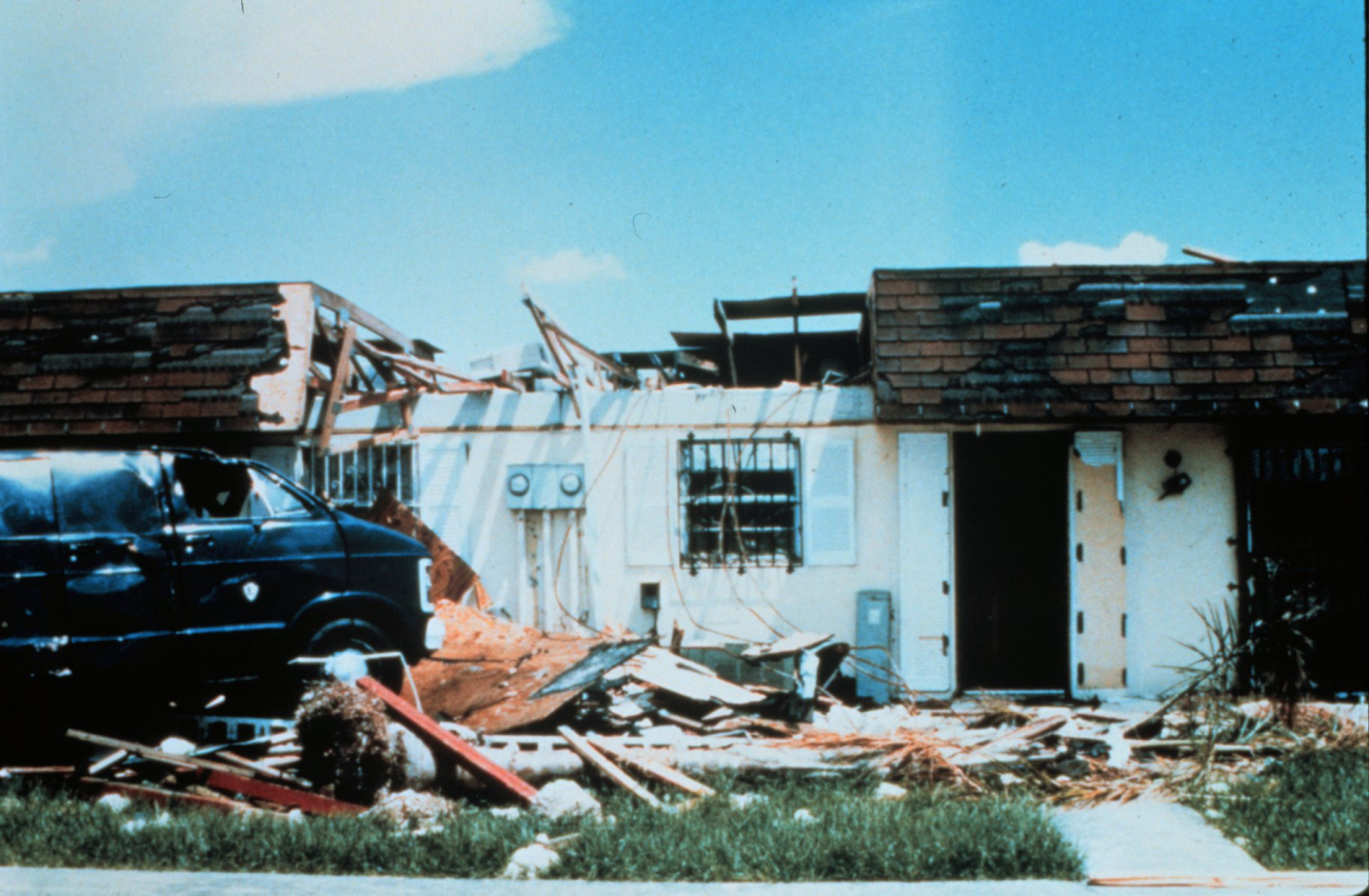 Hurricane Andrew - Front view of a home in which a fatality occurredA concrete tie beam from another unit crashed through the roof of this home