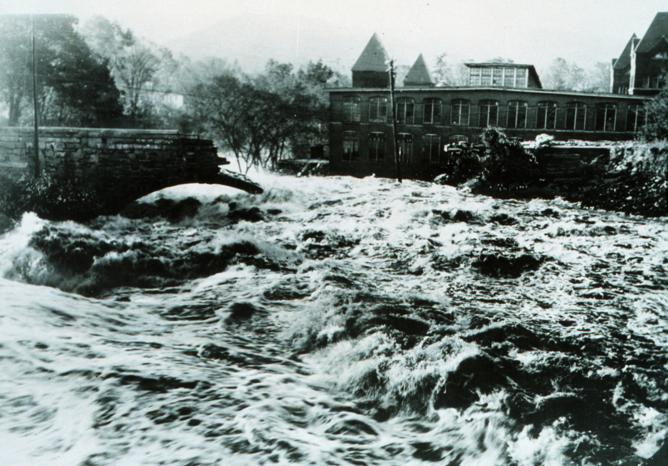 Flooding in the aftermath of a nameless hurricaneThe force of the water tore out the stone bridge in the center of the photo