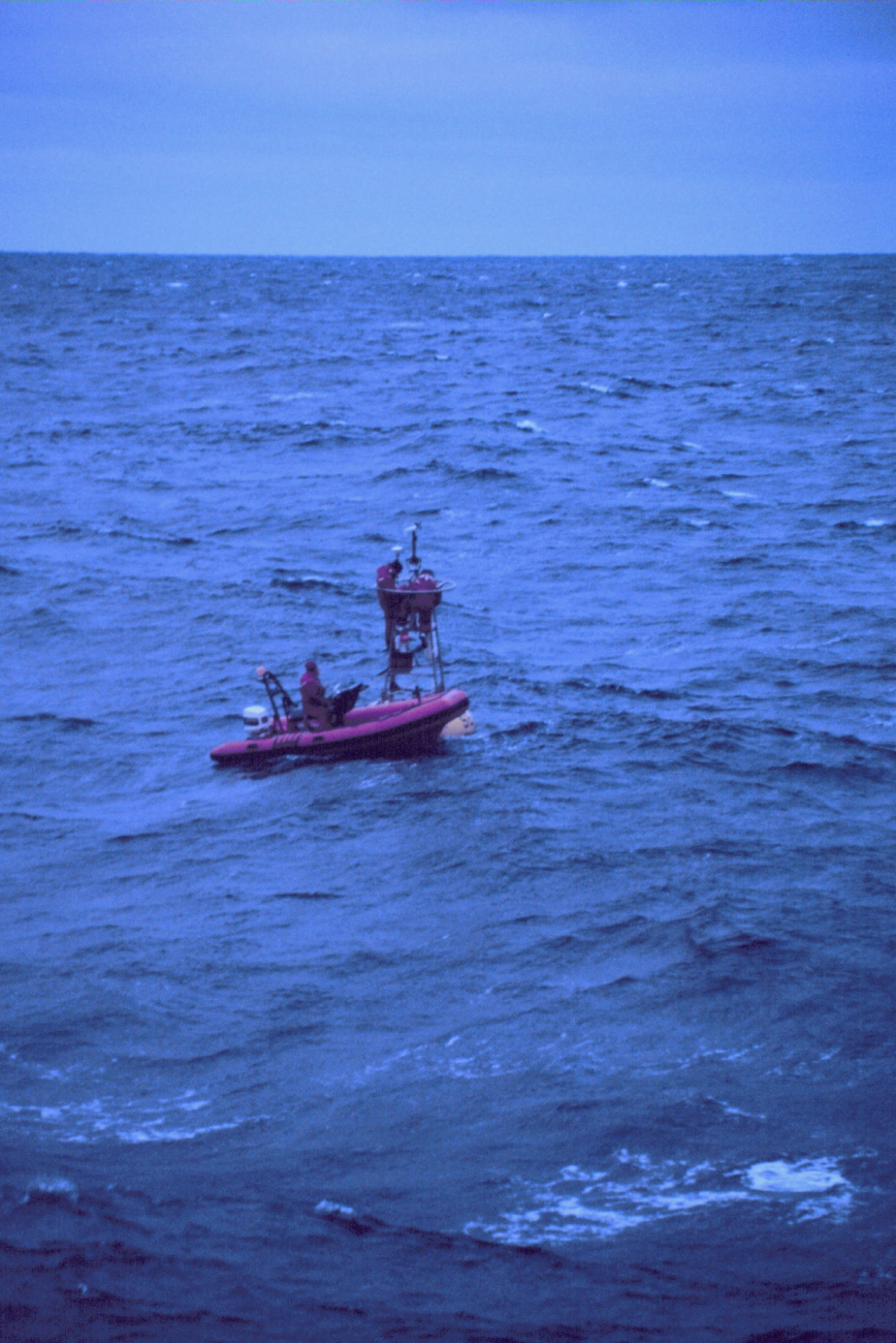 A NOAA weather buoy off Alaska being serviced