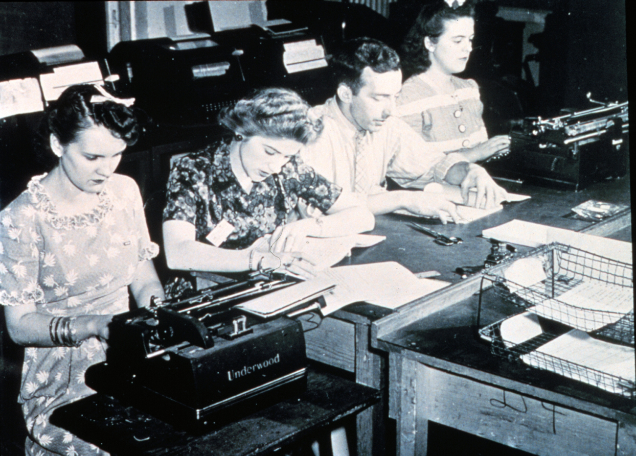 Hard at work in the teletype center - note teletype machines behind personnelWomen's first opportunities in meteorology occurred as a result of WWII