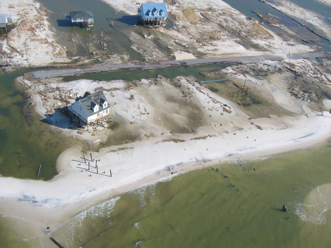 Damage to beach front homes on Dauphin Island, AL