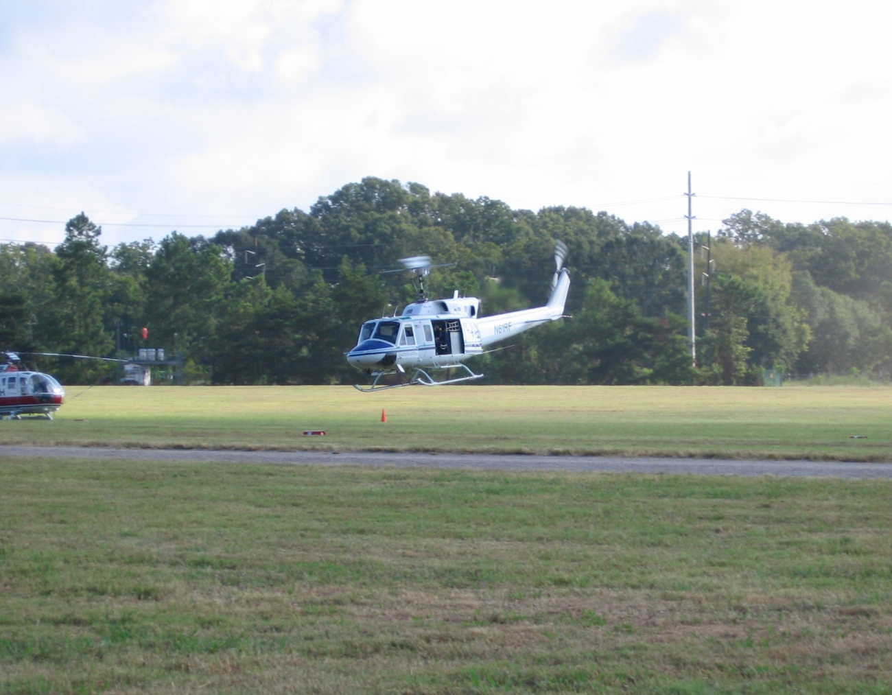 NOAA 61 working with contractor helicopters out of a makeshift heliportnorth of Baton Rouge