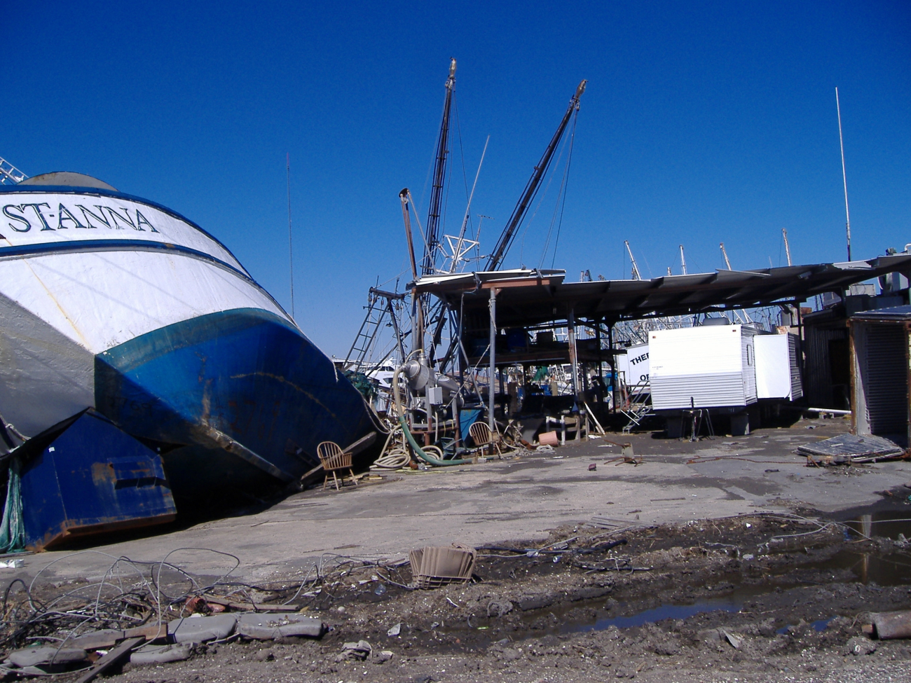 Image #2 showing devastation caused to vessels by Katrina (left image)