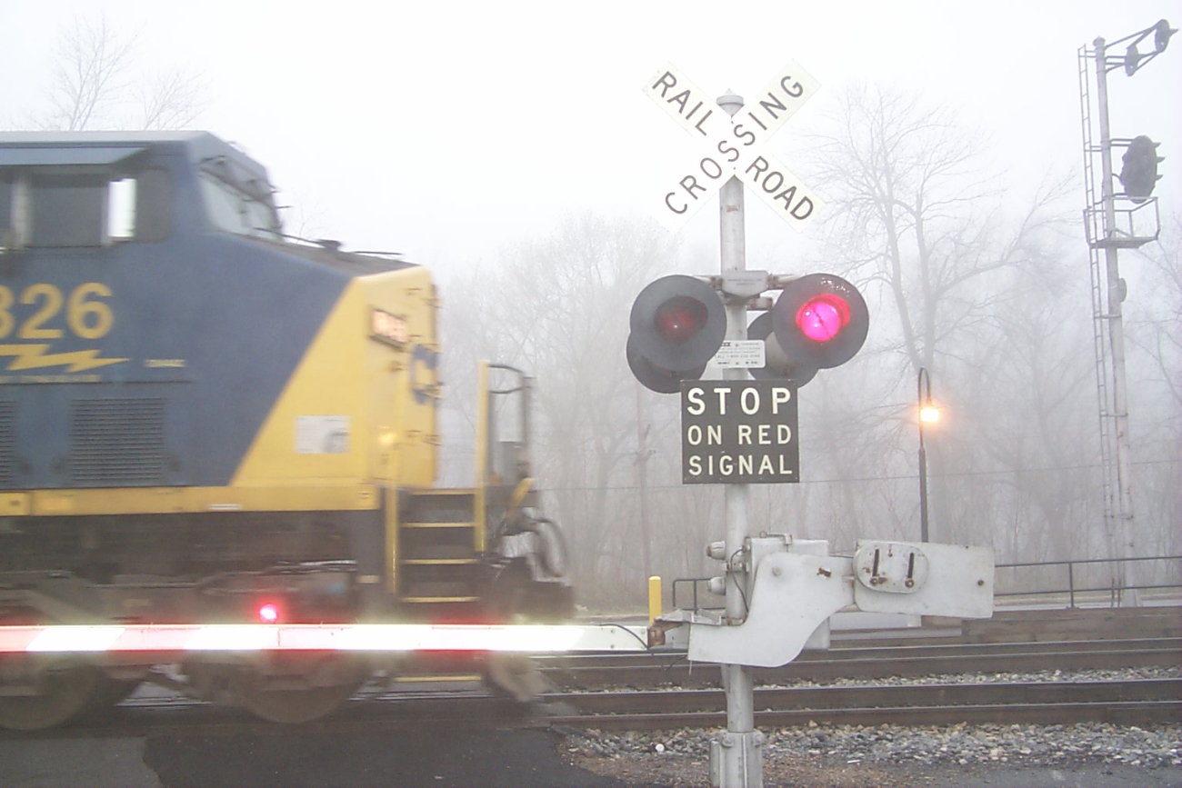A fast freight slicing through the fog at Brunswick, MD