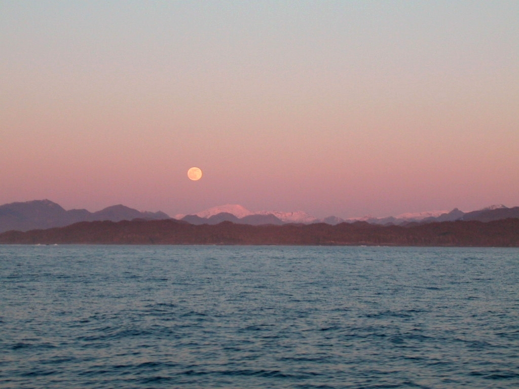 Moon rise over Alaskan mountains