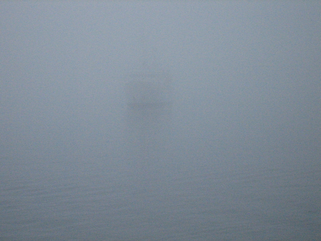 Photo #1 of NOAA Ship FAIRWEATHER approaching pier in fog at Valdez