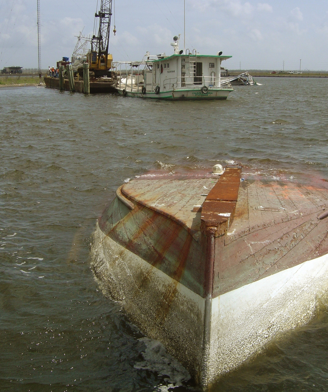 Salvaging a sunken vessel following Hurricane Katrina