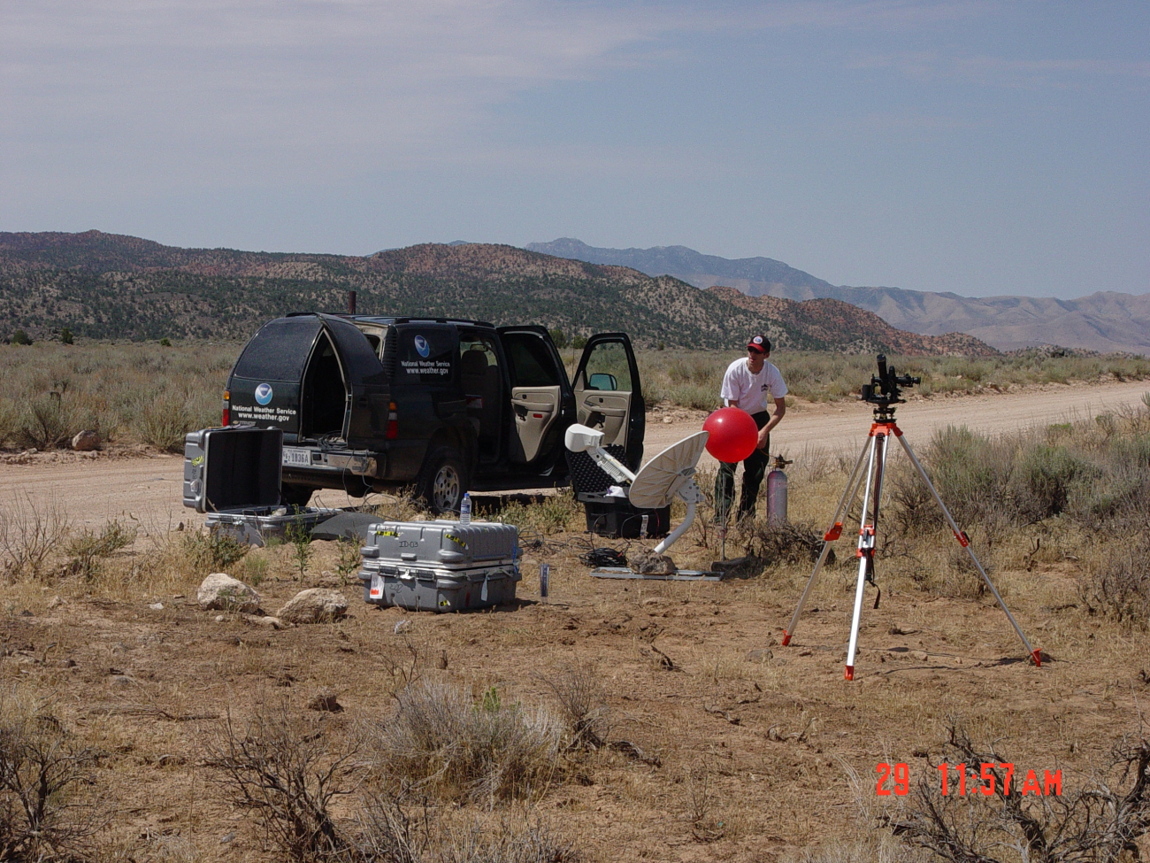 Incident Meteorologist Chris Jordan prepares a PIBAL for launch tomonitor winds on the Reilly Fire in southern Utah