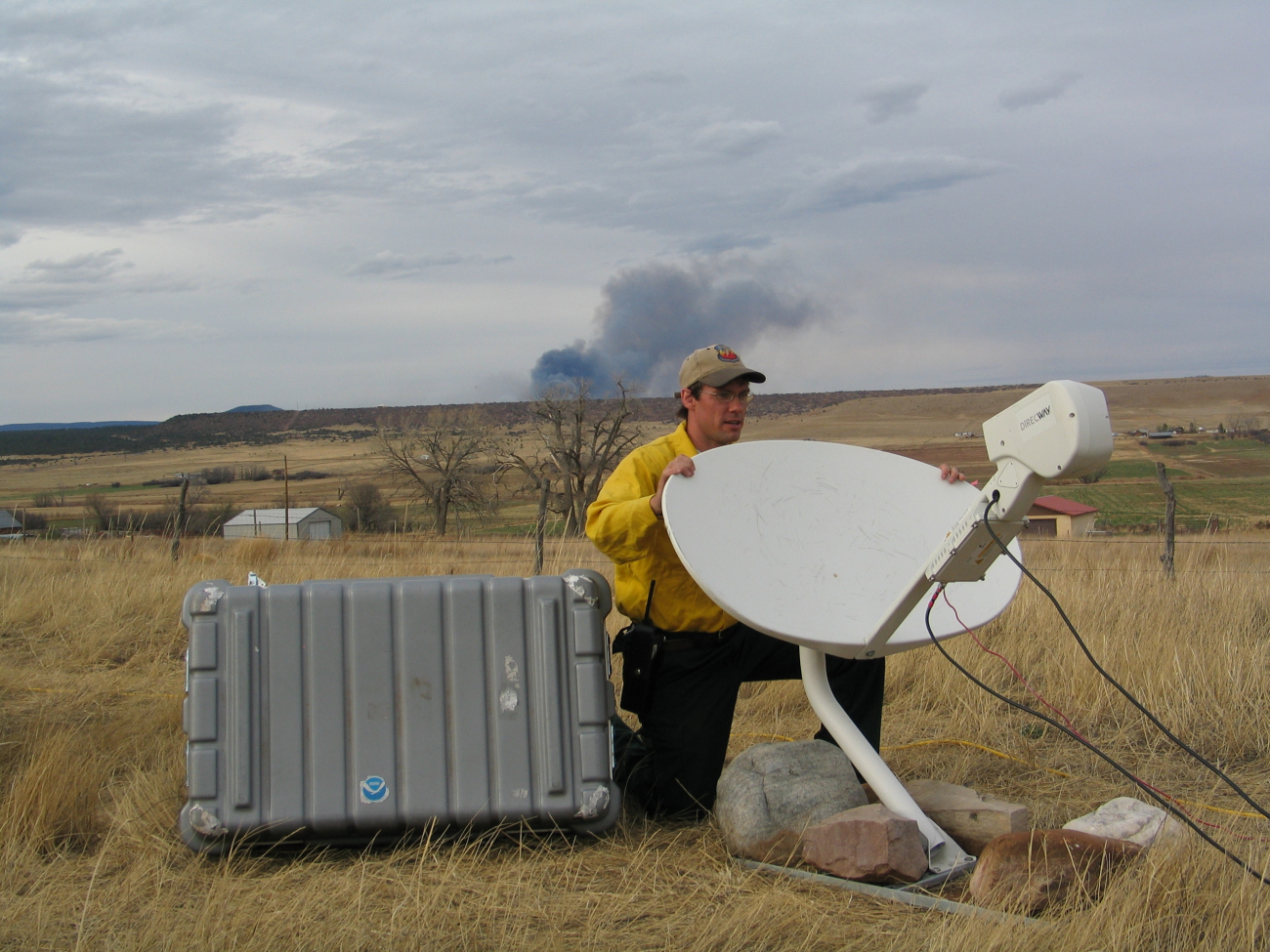 National Weather Service IMET Brent Wachter aiming/positioning the Direcwaysatellite dish