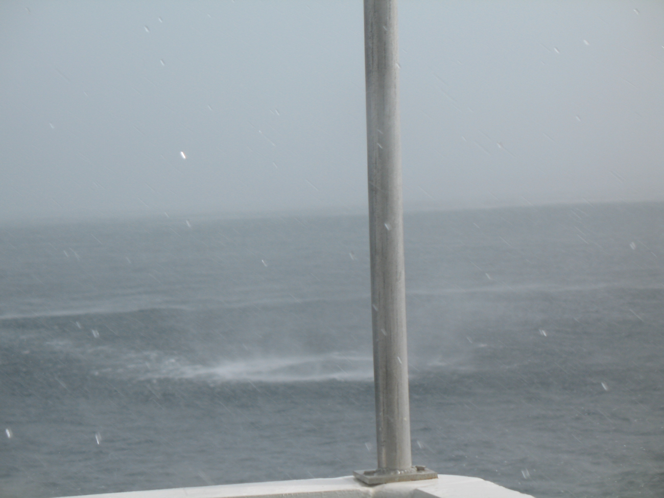 Waterspout sequence as the spray from a waterspout approaches the NOAA ShipGORDON GUNTER which is constrained in its ability tomaneuver as the recently launched TAO buoy is not yet anchored and is stillsecured by its mooring line to the ship